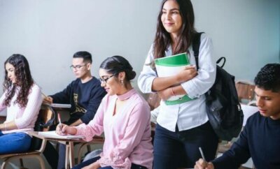 A group of students working at their desks.