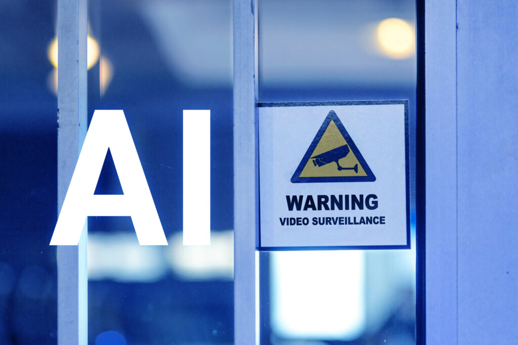 AI Video Surveillance sign on a glass door